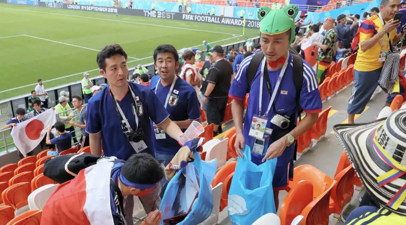 Senegal and Japan Fans Cleaning Up Act